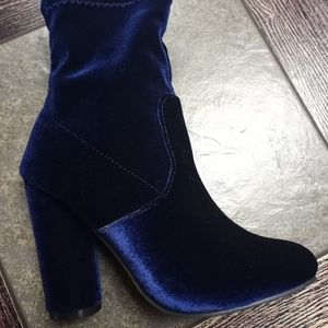 number 6 blue high heel boot